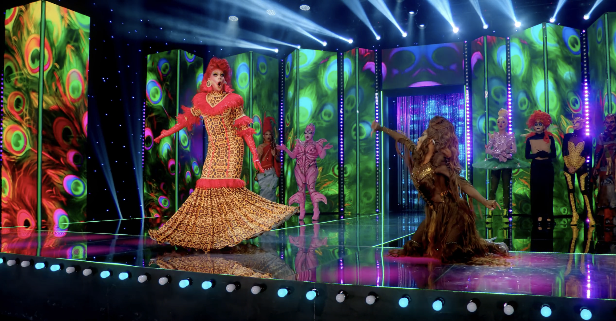 Mellody Queen and DesiRée Beck performing on the runway in front of the other contestants